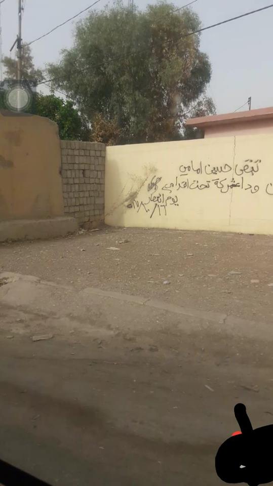 Sectarian signs against Peshmerga forces; 